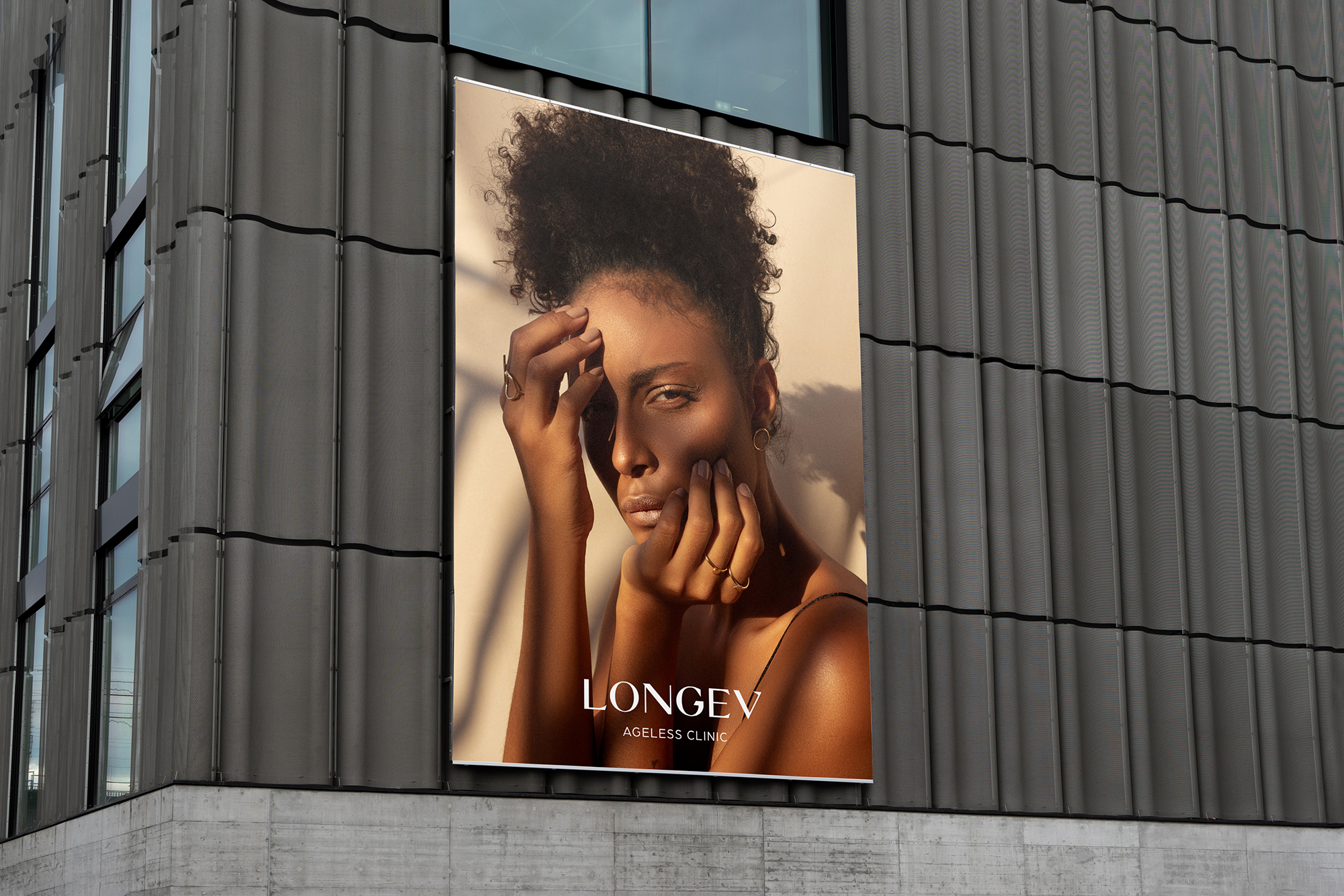 Longev billboard with a woman modeling her glowing skin.